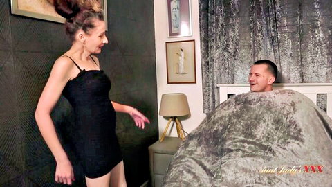 Scarlet in tight black dress teases smiling man in bed, Aunt Judys XXX