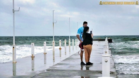 Half-Indian half-Ukrainian teen with massive tits on beach pier