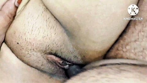 Close-up of hairy balls and stretched anus during intense anal pounding.