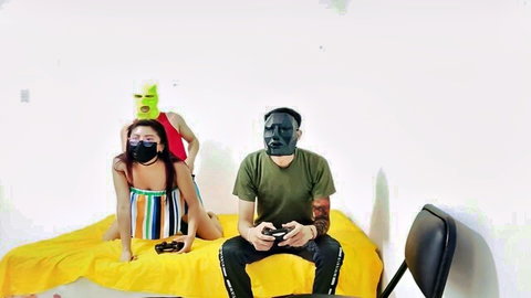 Topless masked woman with big tits teases gamer guy in amateur threesome