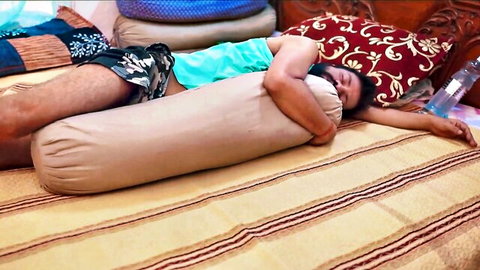 Antim, young Indian man in t-shirt and shorts, resting on bed