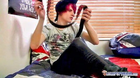 Shy red-haired emo guy holding collar, teasing in Love Trans Sex solo scene