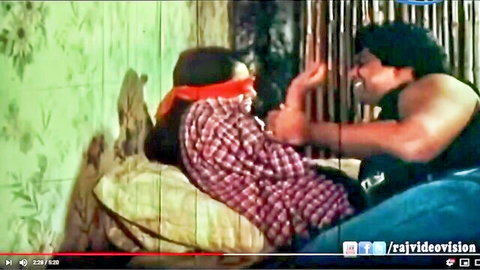 Blindfolded Tamil actress in plaid shirt gets naughty with co-star on bed