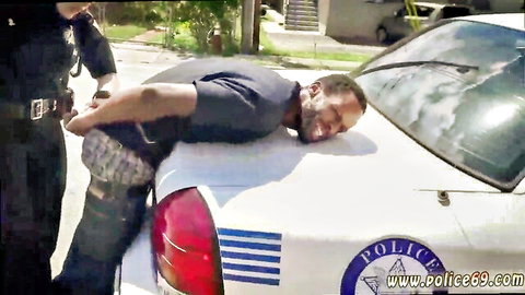 Blonde police milf handcuffs suspect on car hood in arrest threesome fantasy
