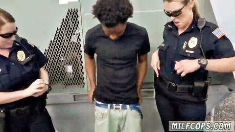 Two MILF cops in uniforms arrest young black peeping tom for hardcore fun