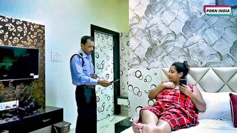 Pregnant Indian wife in red plaid nightie spreads legs on bed teasing standing man