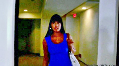 Mercedes Carrera in tight blue dress walking hallway, Netvideogirls
