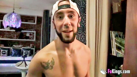 Shirtless bearded man in cap poses in amateur adult video thumbnail