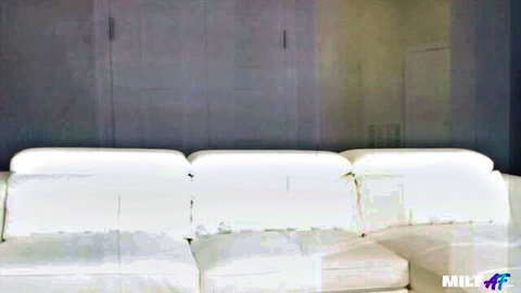 Angel Jackson turning up the heat on white couch in seductive setup