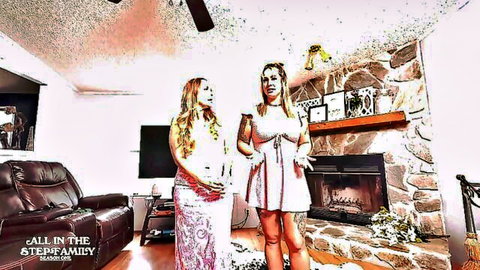 Two busty blondes in tight dresses standing by fireplace in taboo all in family living room tease