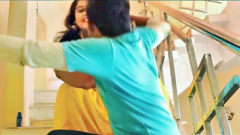 Indian aunty in yellow dress tempts stepson with passionate embrace