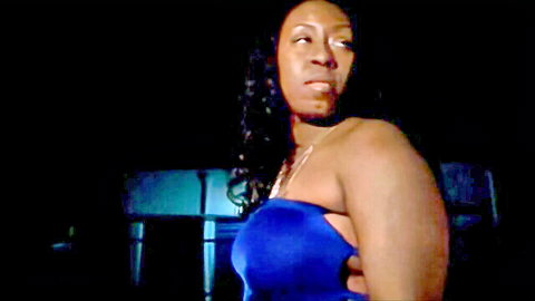 Ms. Marshae in tight blue strapless dress, seductive side pose