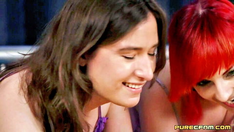 Two cute women, brunette and redhead, smile in sexy CFNM lingerie tease