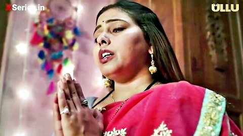 Gorgeous Indian MILF in red saree praying sensually