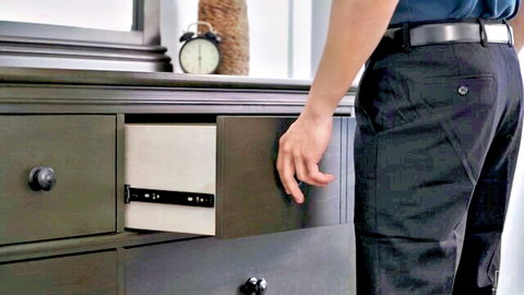 Emma Rosie erotic bedroom tease with man opening drawer