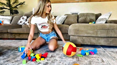 Emily Jade blonde bombshell in tight shorts playing toys on casting couch