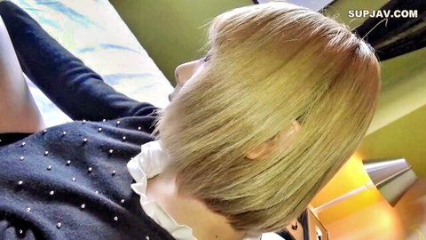 Blonde bob haircut Asian amateur in collared sweater side profile