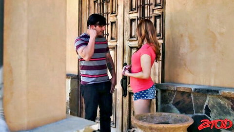 Pregnant redhead Edyn tempts tattooed man outside in pink top and shorts