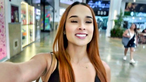 Abella Olsen sexy redhead selfie in mall, smiling in black dress