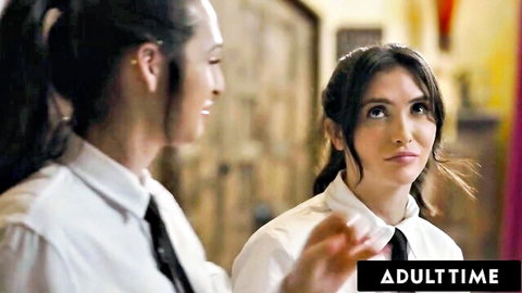 Khloe Kay and Jane Wilde in office uniforms, intense eye contact at work