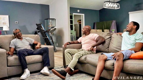 Richard Mann and two black men chilling on couch in Evil Angel video