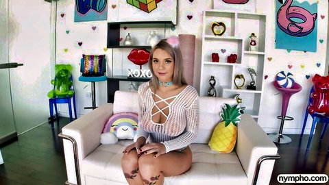 Gabbie Carter in sheer mesh top, busty blonde posing seductively solo