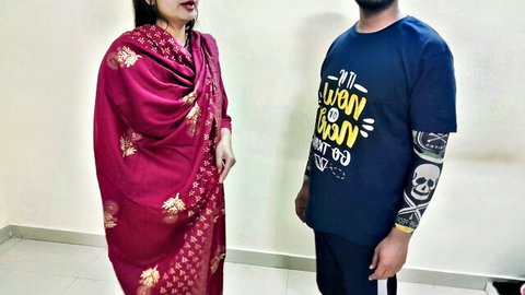 Indian bhabhi in red saree poses with tattooed step-son-in-law in hot family roleplay scene