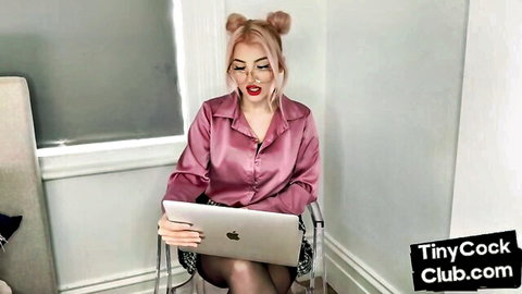 Blonde in pigtails and satin blouse mocks tiny cock on laptop, humiliation scene