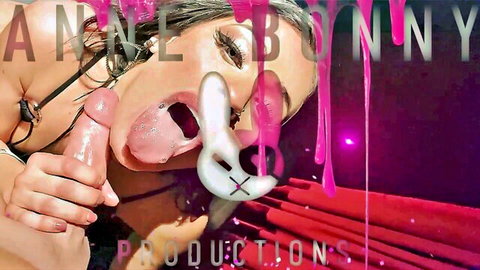 Petite teen sticks tongue out to suck shiny pink dildo with dripping pink slime