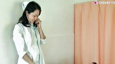 Sexy Asian nurse in white uniform holding stethoscope and phone, smiling