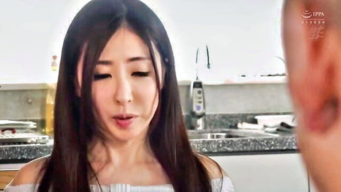 Seductive Japanese woman in off-shoulder top, teasing close-up view