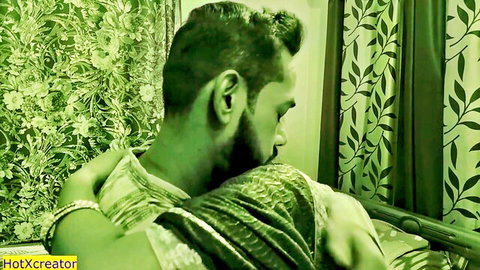 Desi Bhabhi in green saree embraced from behind by Indian man in Tamil hook-up scene