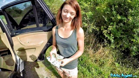 Tera Link holds cash outdoors in Public Agent pickup scene