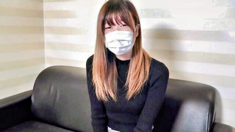 Asian woman in face mask and black sweater, long hair, happy ending tease
