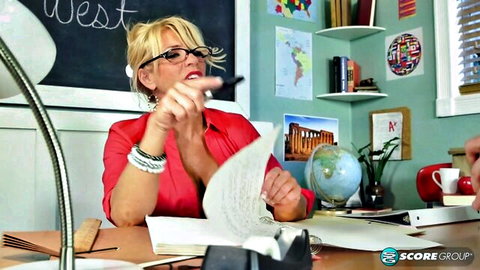 Blonde Gina West as sexy teacher with glasses and cleavage in classroom tease