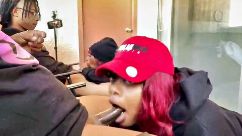 Mini Stallion deepthroats cock while smoking blunt in group scene