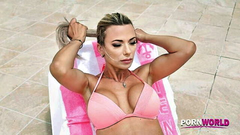 Shalina Devine in pink bikini, blonde ponytail, fit body lounging poolside