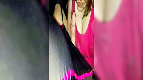 Buxom dark-haired woman giving sloppy blowjob in pink top