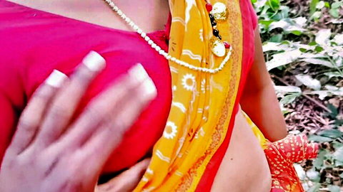 Curvy Indian stepmom in pink saree fondling breast in forest