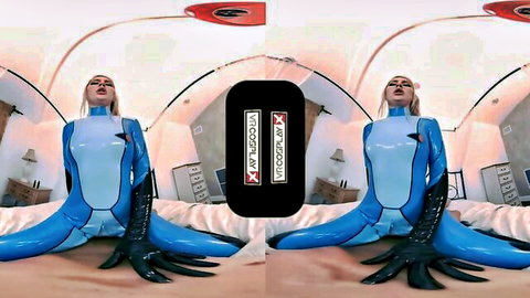 Lila Frey as Samus in tight blue latex suit, Metroid XXX cosplay parody