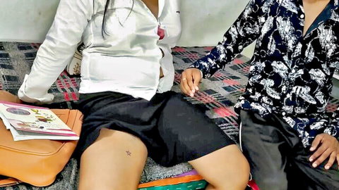 Sexy Indian MILF in white blouse black shorts spreads legs as man gropes thigh on bed