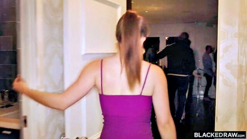 Petite brunette in tight purple tank top enters room with black men at interracial party