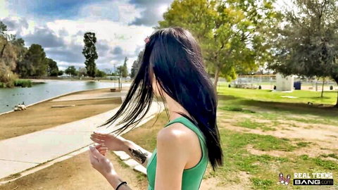Bella Nova outdoor tease in green tank top, long black hair