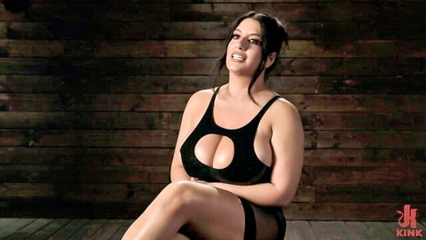 Sarah Arabic in black cutout lingerie, smiling seductively