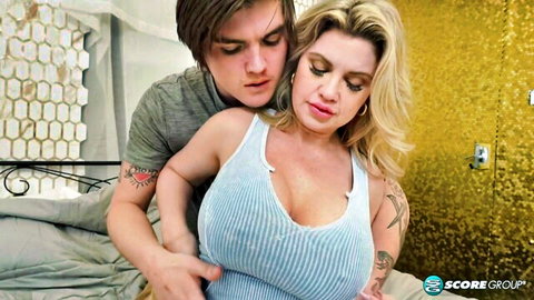Busty blonde Andie Anderson in intimate embrace during hardcore scene