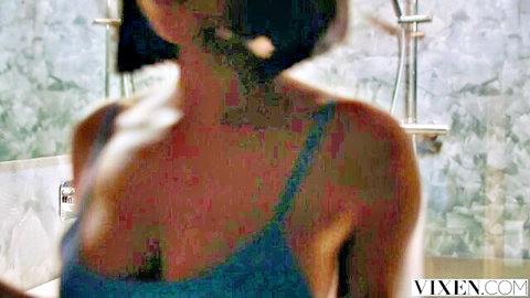 Eve Sweet in steamy shower, blue lingerie slipping off her curves