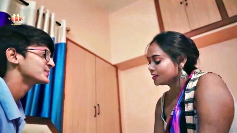 Indian MILF in saree shares intimate gaze with young man after 18-year gap