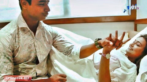 Indian Bhabhi Suya025 and Biar 004 sharing playful intimate touch in bed