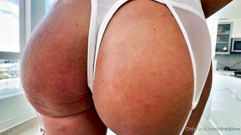 Curvy white babe bends over showing huge juicy ass cheeks in sheer white thong kitchen tease