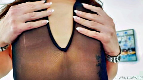 Pat Myne in sheer black lingerie, hands cupping breasts, sultry pose